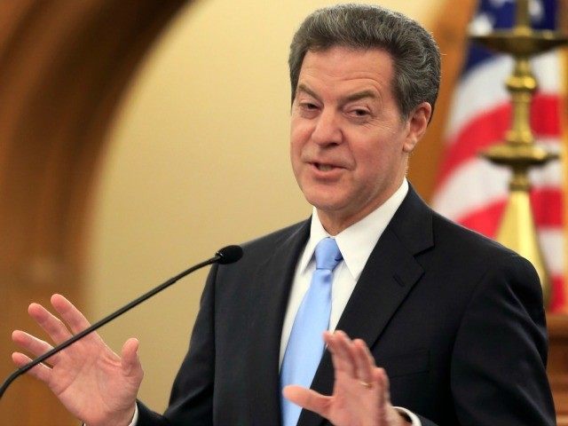 Kansas Gov. Sam Brownback delivers his State of the State address to a joint session of the legislature in Topeka Kan. Tuesday Jan. 12 2016