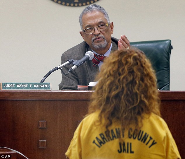 As she appeared before Judge Salvant in a bright yellow jumpsuit and glasses stuck in her curly hair she told Salvant that her belongings and passport were taken by authorities in Los Angeles