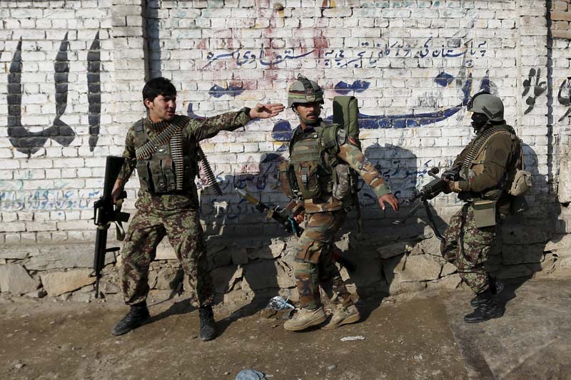 Afghan National Army soldiers arrive after a blast near the Pakistani consulate in Jalalabad