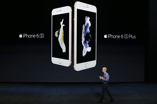 Apple CEO Tim Cook discusses the new iPhone 6s and iPhone 6s Plus during the Apple event at the Bill Graham Civic Auditorium in San Francisco. Most analysts believe Apple surpassed its own record by sel