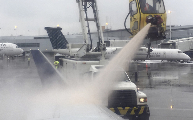 Morrow shows de-icing on a Delta Airlines passenger plane about to depart Chicago’s Midway Airport for Minneapolis today in Chicago