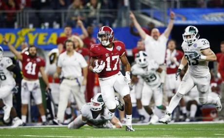 Running back Kenyan Drake of the Alabama Crimson Tide ran for 58-yards in the fourth quarter against the Michigan State Spartan