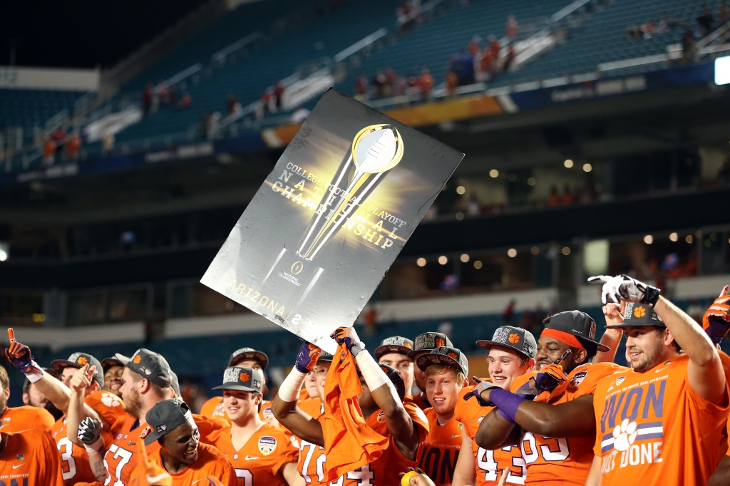 Clemson Tigers players celebrate after defeating the Oklahoma Sooners 37-17 in the 2015 Capital One Orange Bowl at Sun Life Stadium in Miami Gardens Florida on Dec. 31 2015