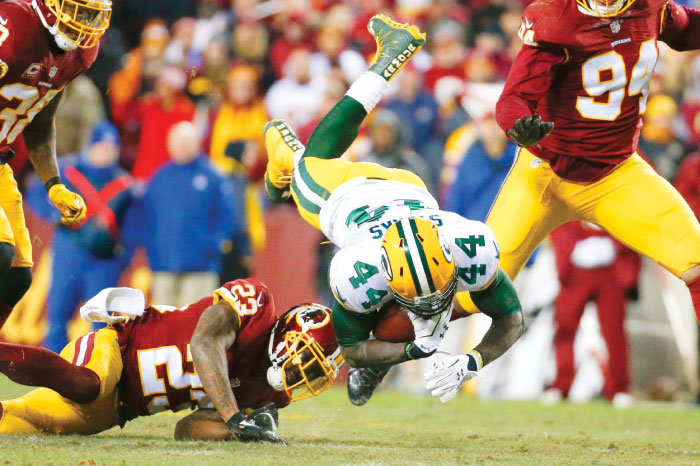 Packers roll past Redskins