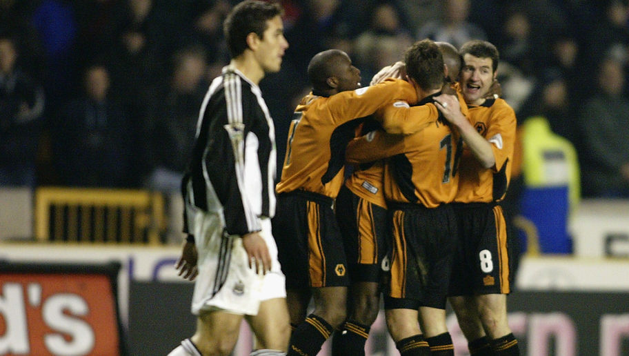 George Ndah of Wolverhampton Wanderers celebrates scoring the winning goal with team-mates