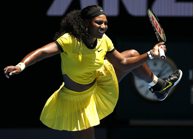 Serena Williams of the United States lifts her leg during their first round match against Camila Giorgi of Italy at the Australian Open tennis championships in Melbourne Australia Monday Jan. 18 2016