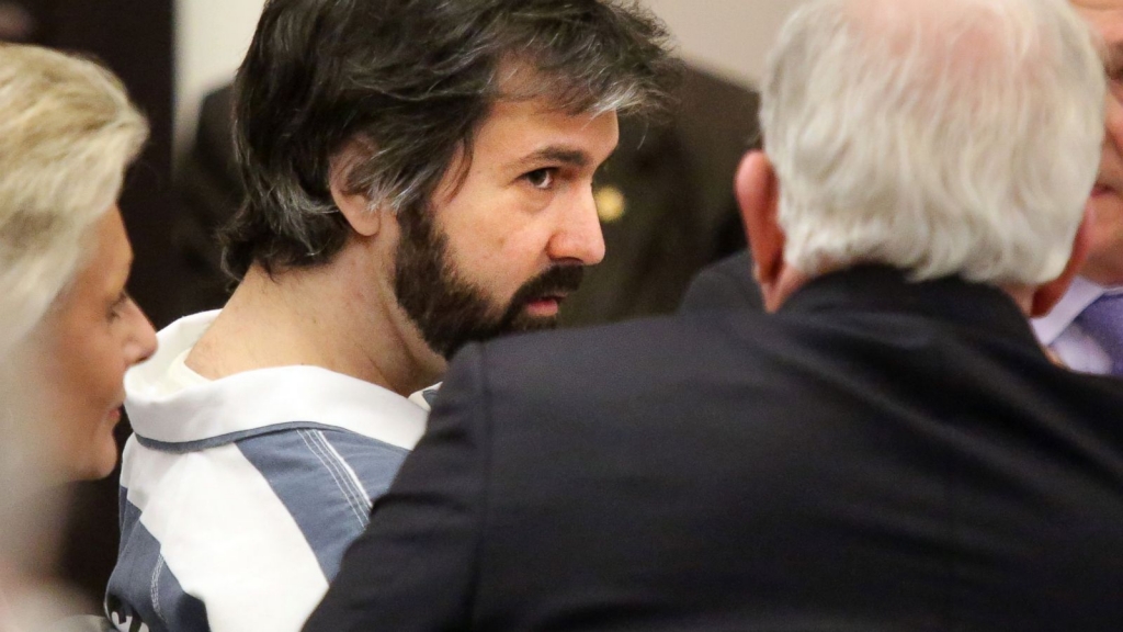 Former North Charleston Police officer Michael Slager talks with his attorney Andy Savage before a hearing in front of Judge Clifton Newman in Charleston S.C. Monday Jan. 4 2016