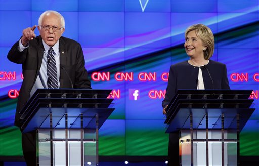 Sen. Bernie Sanders of Vermont left speaks as Hillary Clinton looks on during the CNN Democratic presidential debate in Las Vegas. Sanders is on the list of the most notable quotes of 2015 as compiled