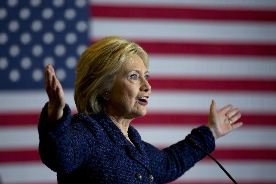 Clinton TV ads hammer guns in NH shy away in Iowa