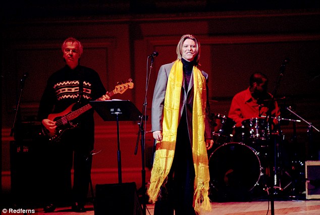 Bowie and Tony Visconti perform live onstage at the Tibetan Freedom concert in New York in 2001