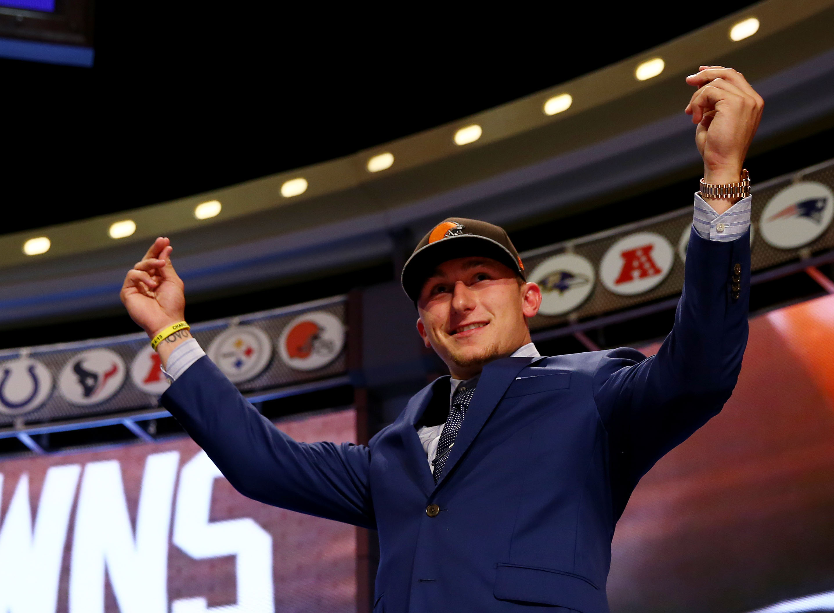 NEW YORK NY- MAY 08 Johnny Manziel of the Texas A&M Aggies takes the stage after he was picked #22 overall by the Cleveland Browns during the first round of the 2014 NFL Draft at Radio City Music Hall