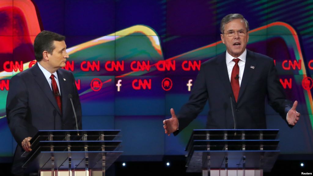 FILE- U.S. Senator Ted Cruz of Texas left and former Florida Governor Jeb Bush spar during the Republican presidential debate in Las Vegas Nevada Dec. 15 2015