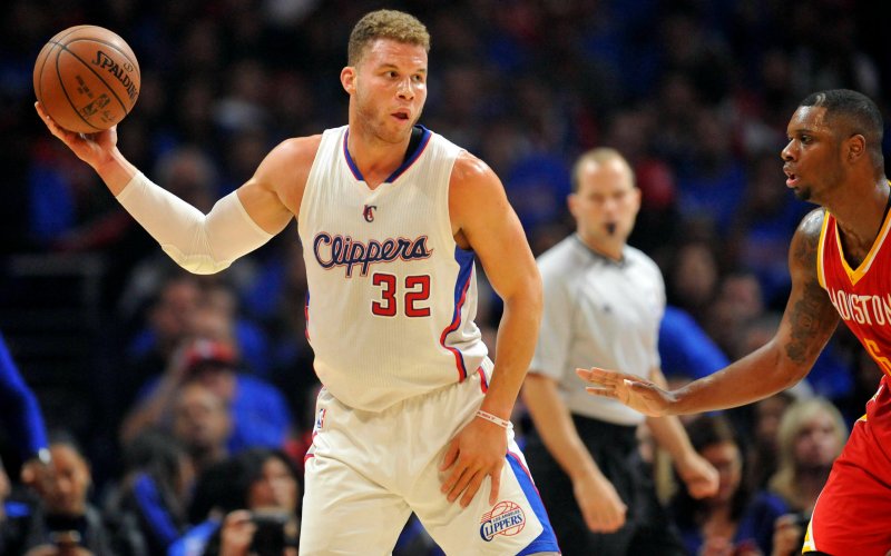 Los Angeles CA USA Los Angeles Clippers forward Blake Griffin controls the ball against the defense of Houston Rockets forward Terrence Jones during the first half in game three of the second round of the NBA Playoffs. at Staples