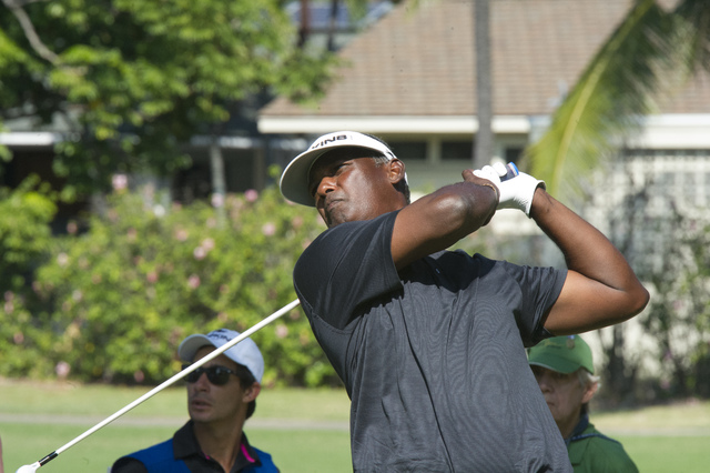 Vijay Singh tees off on the 8th hole today at the Sony Open. Singh finished at 7-under