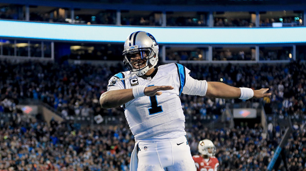 Cam Newton #1 of the Carolina Panthers celebrates scoring a touchdown in the second quarter against the Arizona Cardinals during the NFC Championship Game