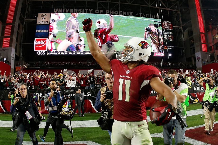 Cardinals receiver Larry Fitzgerald celebrates his game-winning touchdown in overtime