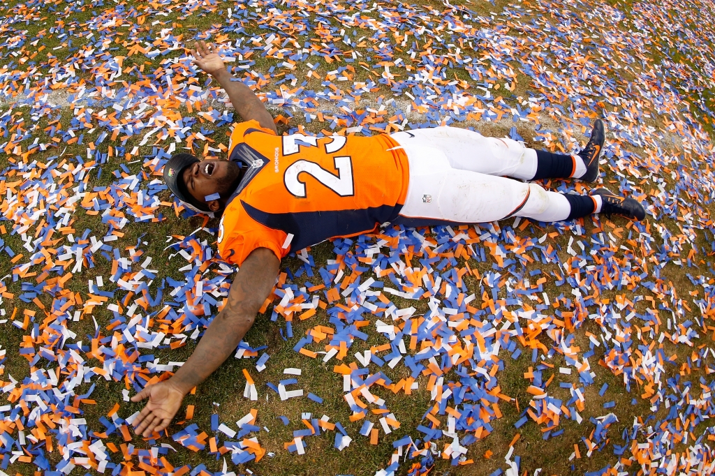 Ronnie Hillman #23 of the Denver Broncos celebrates after defeating the New England Patriots in the AFC Championship game at Sports Authority Field at Mile High