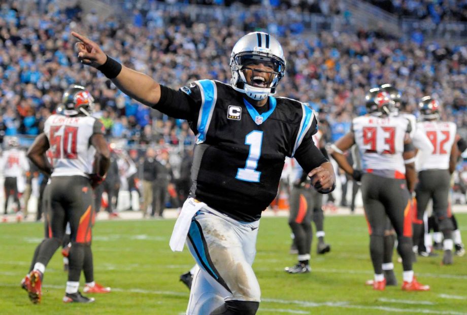 Carolina Panthers quarterback Cam Newton celebrates a Panthers touchdown against the Tampa Bay Buccaneers in the first half of an NFL football game in Charlotte N.C. Sunday Jan. 3 2016