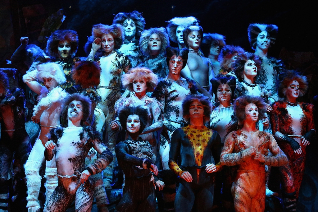 Cast members perform during a media call for CATS at Capitol Theatre