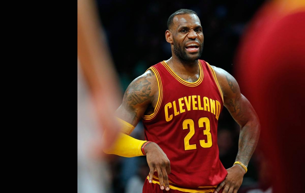 Cleveland Cavaliers forward Le Bron James talks to his teammates in the second half of an NBA basketball game against the Brooklyn Nets Wednesday Jan. 20 2016 in New York