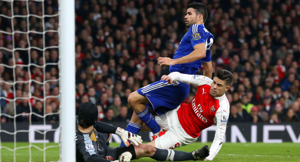 Chelsea's Diego Costa scores his side's first goal of the match during the Barclays Premier League match at the Emirates Stadium London