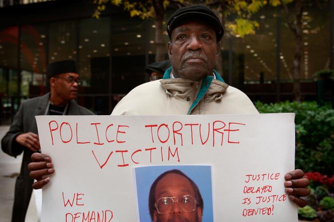 83450770-aaron-cheney-demonstrates-outside-the-federal-courthouse