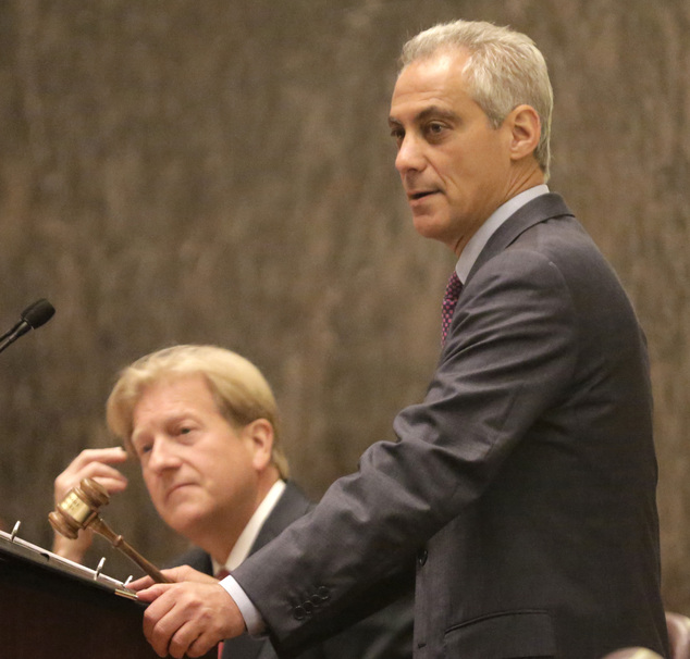 Chicago Mayor Rahm Emanuel right accompanied by chief Corporation Counsel Stephen Patton speaks before the City Council in C