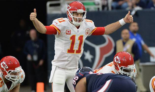 Kansas City Chiefs quarterback Alex Smith calls a play during the first half of an NFL wild-card playoff football game against the Houston Texans Saturday Jan. 9 2016 in Houston