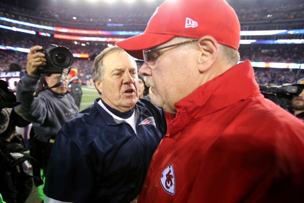 Head coach Bill Belichick of the New England Patriots and head coach Andy Reid of the Kansas City Chiefs shake hands after the AFC Divisional Playoff Game at Gillette Stadium on Saturday in Foxboro Massachusetts. The Patriots defeated the Chiefs 27-20