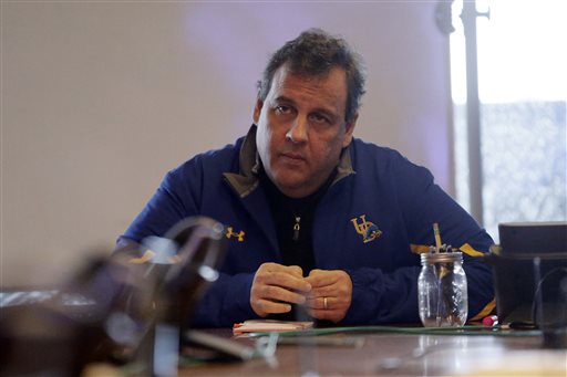 New Jersey Gov. Chris Christie listens to a briefing on a snowstorm during a visit to the New Jersey Department of Transportation Traffic Management and Technology Center Saturday Jan. 23 2016 in Woodbridge N.J. Towns across the state are hunkering