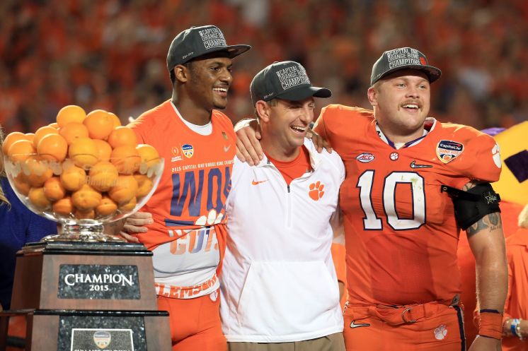 From left QB Deshaun Watson coach Dabo Swinney and linebacker Ben Boulware celebrate an Orange Bowl victory that puts Clemson into its first national title game since 1981. Watson was effective passing and running accounting for 332 yards