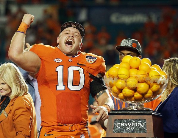 Clemson quarterback Deshaun Watson throws oranges to the crowd after his team won the Orange Bowl NCAA college football semifinal playoff game against Oklahoma Thursday Dec. 31 2015 in Miami Gardens Fla. Clemson defeated Oklahoma 37-17. (AP