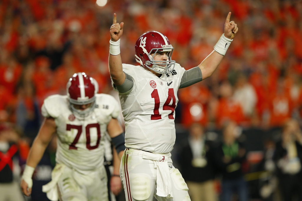 Alabama's Jake Coker celebrates after Derrick Henry scored a one yard touchdown in the fourth quarter against the Clemson Tigers during the 2016 College Football Playoff National Championship Game