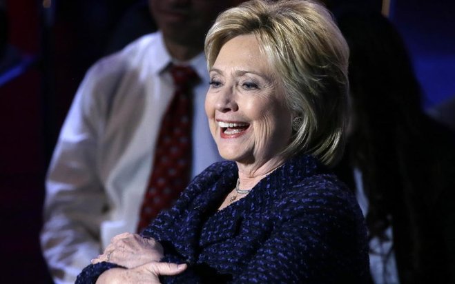 Democratic presidential candidate Hillary Clinton Why wouldn’t she be smiling given the way the GOP race has gone so far