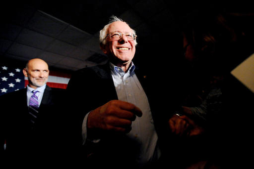 U.S. Democratic presidential candidate Bernie Sanders works the rope line at a New Year's Eve rally and party at the Renaissance Savery Hotel in Des Moines Iowa Dec. 31 2015