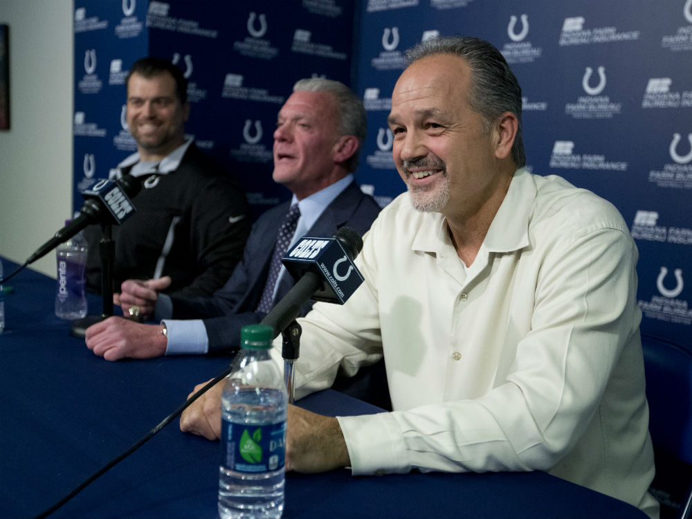 Indianapolis Colts head coach Chuck Pagano speaks after the announcement of his contract extension as owner Jim Irsay and general manager Ryan Grigson looks on during a press conference at the NFL team's practice facility in Indianapolis Monday Jan