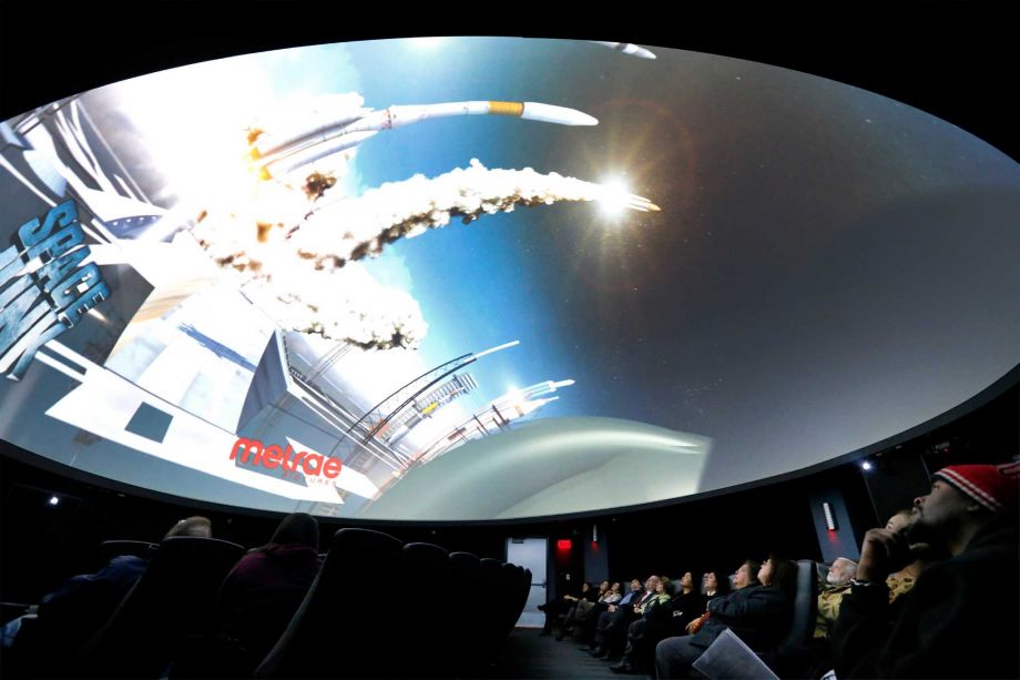 Guests including Kevin Moore view a video shown in the Scobee Education Center planetarium as San Antonio College and the Scobee Education Center hosts the 30th Anniversary Challenger Remembrance ceremony on Thursday Jan. 28 2016. The ceremo