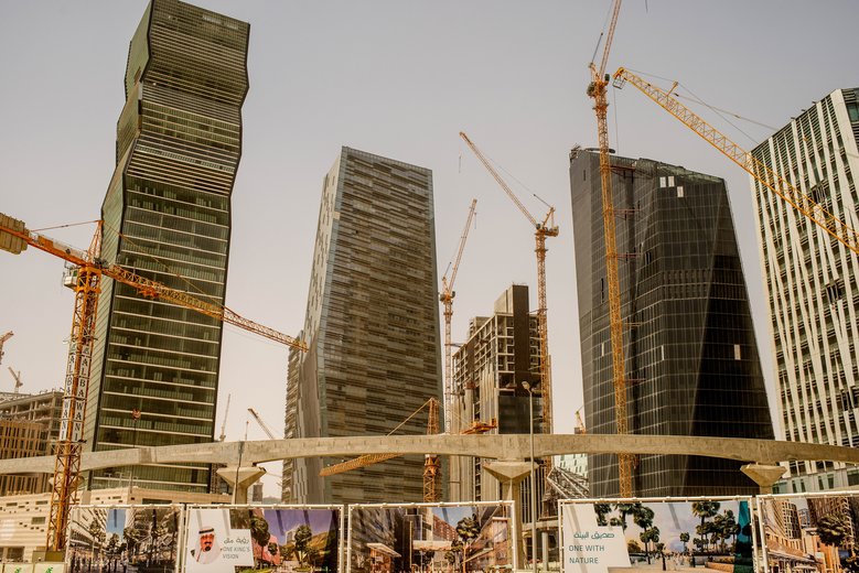 Construction under way in Riyadh’s financial district. Private business may have a bigger role in the economy