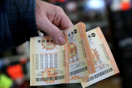 The Latest: $1.6B Powerball jackpot will be split 3 ways