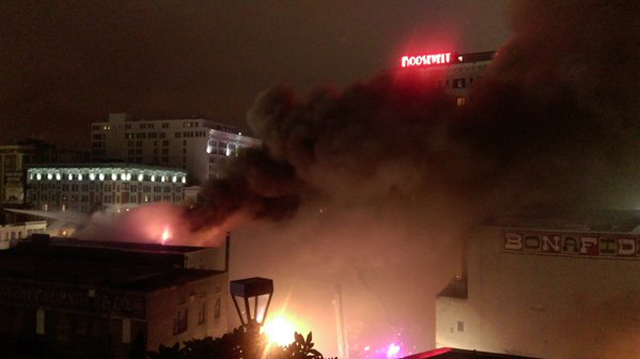 New Orleans firefighters at building fire on Canal Street