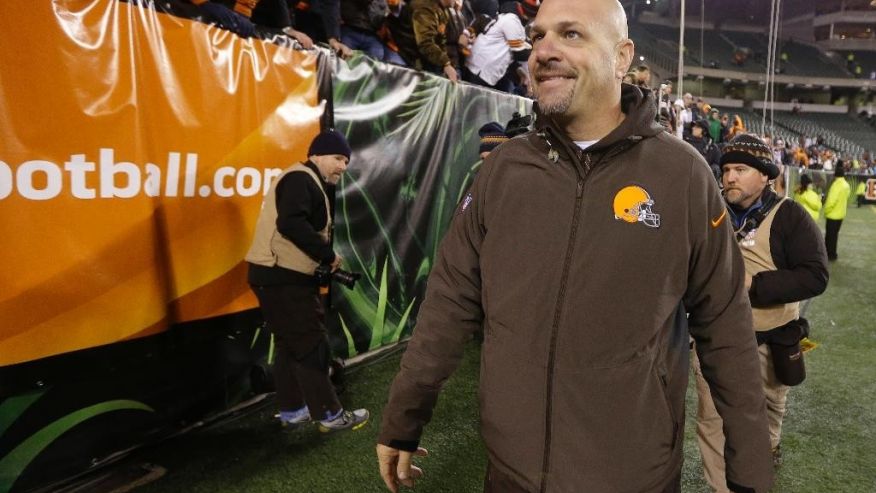 Cleveland Browns coach Mike Pettine smiles as he leave the field following the Browns&#x27 24-3 in an NFL football game against the Cincinnati Bengals on Thursday Nov. 6 2014 in Cincinnati