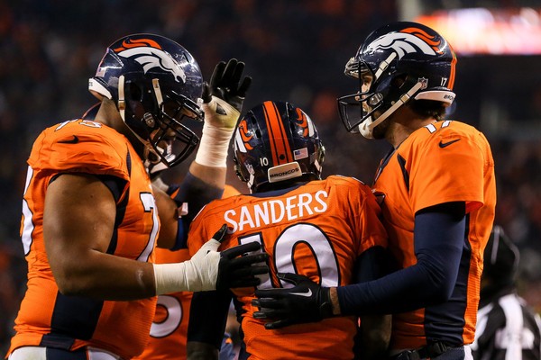 Broncos clinch playoff with victory, but Chiefs still can win division