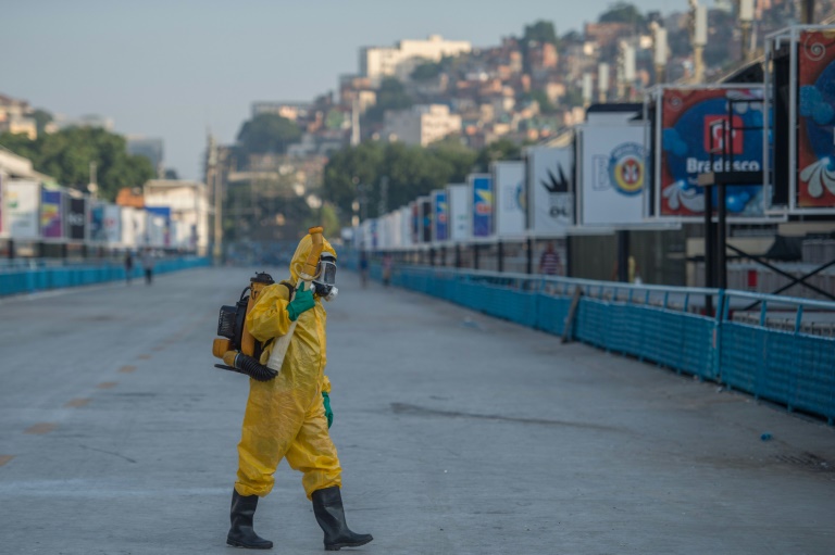 AFP  File  Christophe SimonA municipal agent sprays for Zika mosquitos in Rio de Janeiro