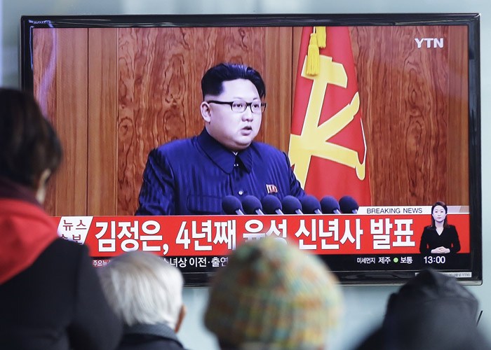 South Koreans watch a TV news program showing North Korean leader Kim Jong Un Friday. North Korea said it has conducted a hydrogen bomb test- a move that would put the country a step closer to improving its still-limited nuclear arsenal