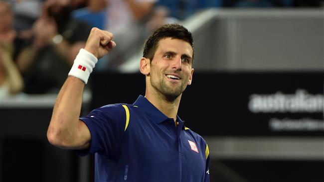 Serbia's Novak Djokovic celebrates a point during his men's singles match against Italy's Andreas Seppi on day five of the 2016 Australian Open tennis tournament in Melbourne