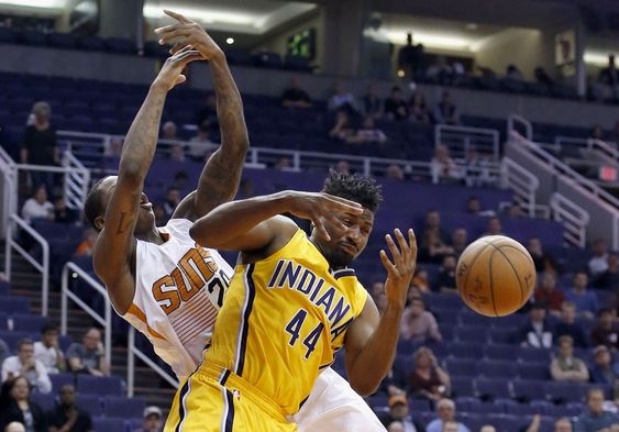 Hill and Phoenix Suns Archie Goodwin left collide as they both try to grab a rebound during the second half of an NBA basketball game Tuesday Jan. 19 2016 in Phoenix. The Pacers defeated the Suns 97-94. (AP