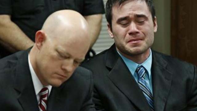 Daniel Holtzclaw right cries as the verdicts are read in his trial in Oklahoma City. At left is defense attorney Robert Gray. A jury found former Oklahoma City police officer Holtzclaw guilty of raping and sexual