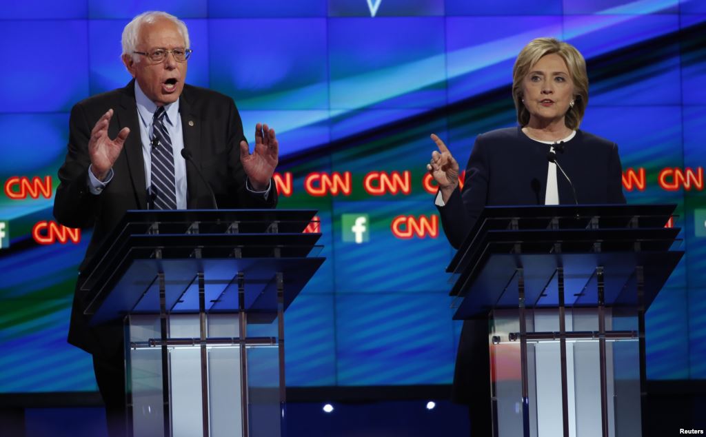 FILE- U.S. Senator Bernie Sanders debates former Secretary of State Hillary Clinton in Las Vegas Oct. 13 2015