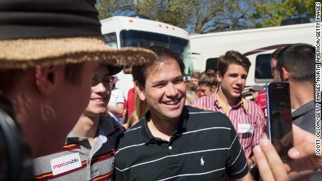 AMES IA- SEPTEMBER 12 Republican presidential candidate U.S. Sen. Marco Rubio  greets fans tailgating outside Jack Trice Stadium before the start of the Iowa State University versus University of Iowa football game