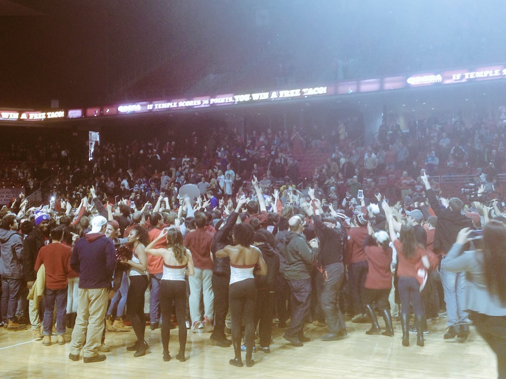 Fans and Players storming the court after defeating SMU